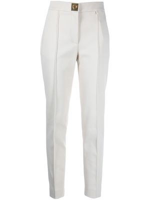 Givenchy Fuseau gold-tone detailed trousers - Black