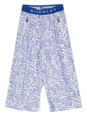 Givenchy Kids all-over print trousers - Blue