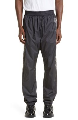Givenchy Relaxed Fit Logo Embroidered Track Pants in Black