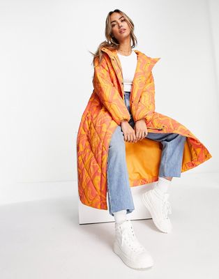 Glamorous caterpillar quilted coat in orange marble-Brown