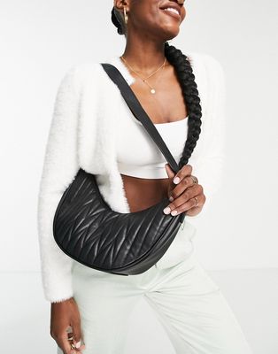 Glamorous quilted sling bag in black
