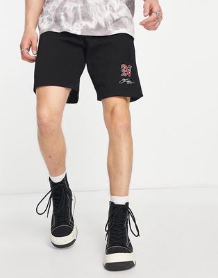 Good For Nothing jersey shorts in black with gothic print - part of a set