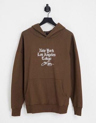 Good For Nothing oversized hoodie in brown with city logo print