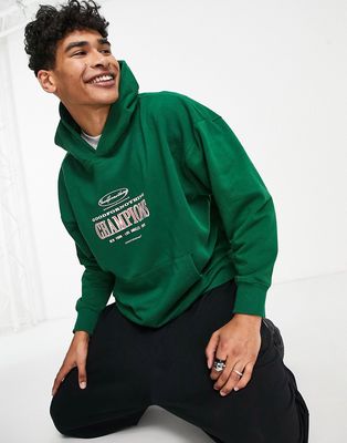Good For Nothing oversized pullover hoodie in green with champions print
