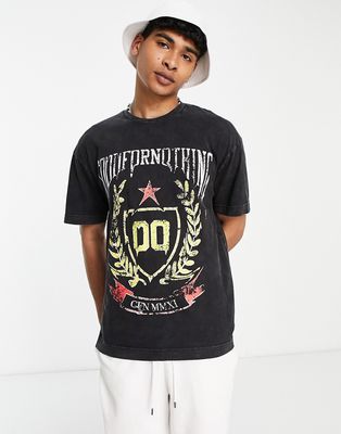 Good For Nothing oversized t-shirt in black acid wash with crest drip print