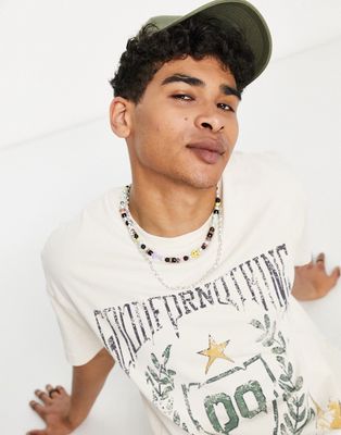 Good For Nothing oversized t-shirt in off white with crest drip print