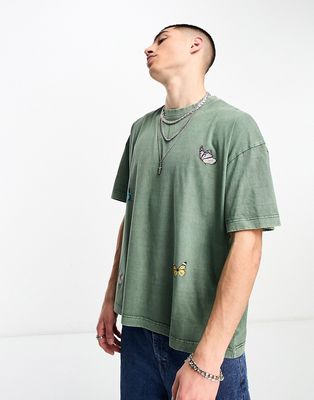 Good For Nothing oversized t-shirt in sage green with butterfly placement prints