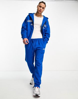 Good For Nothing straight leg sweatpants in cobalt blue with logo print and hem split - part of a set