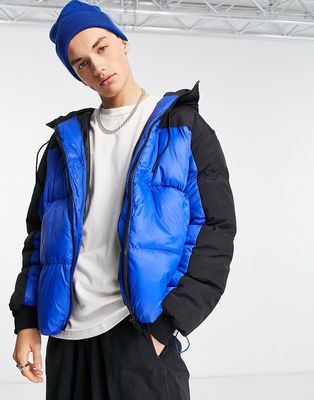 Good For Nothing trek oversized hooded puffer jacket in blue and black color blocking