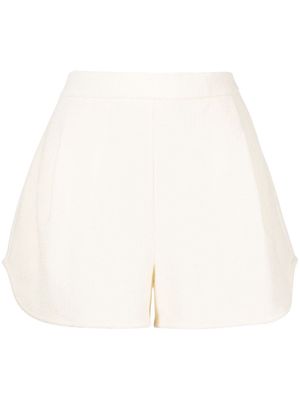 GOODIOUS pleat-detail cloqué shorts - Yellow