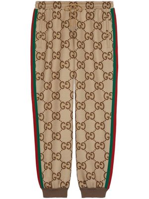 Gucci all-over GG-print trousers - Neutrals