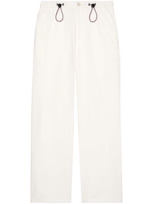 Gucci embroidered-logo twill trousers - White