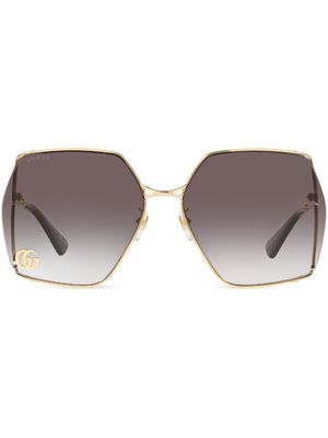 Gucci Eyewear logo-engraved tinted sunglasses - 5000L1 Yellow