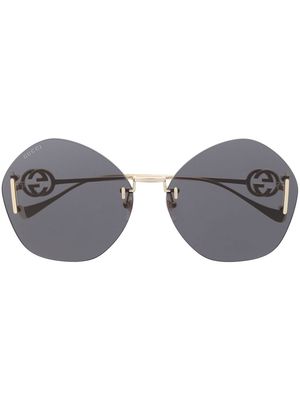 Gucci Eyewear logo-plaque round-frame sunglasses - Gold