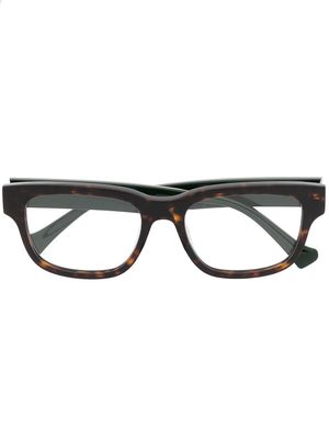 Gucci Eyewear tortoiseshell logo-engraved glasses - Black