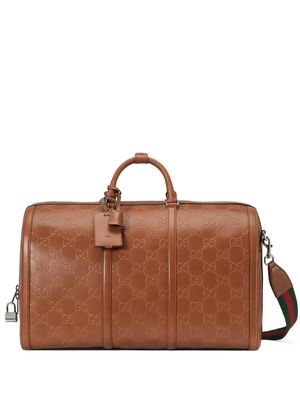Gucci large GG embossed travel bag - Brown