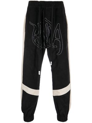 Haculla embroidered-logo drop-crotch trousers - Black