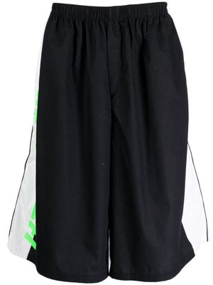 Haider Ackermann logo-print cotton track shorts - Black
