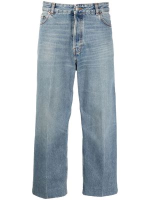 Haikure logo-patch cropped jeans - Blue