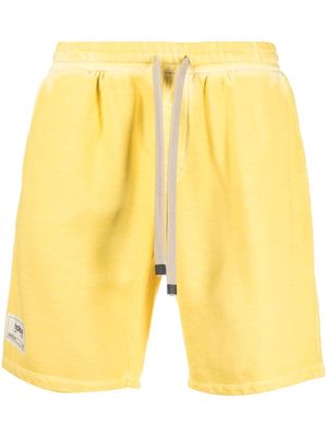 Haikure organic-cotton logo-patch shorts - Yellow