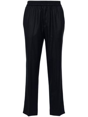 Harmony Paris pressed-crease wool tapered trousers - Blue