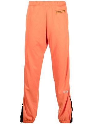 Heron Preston logo-embroidered track pants - Orange