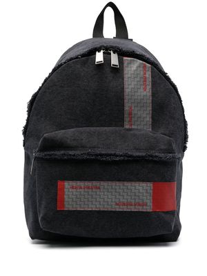 Heron Preston logo-patch distressed backpack - Black