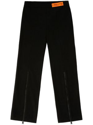 Heron Preston logo-patch zip-up trousers - Black