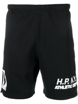 Heron Preston slogan-print cotton shorts - Black