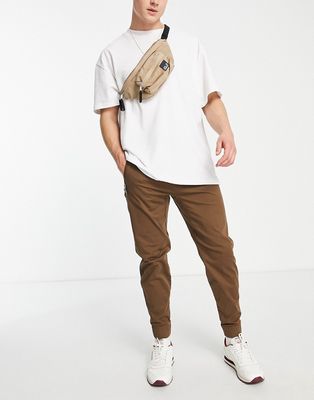 Hollister skinny fit cargo sweatpants in tan with pockets-Neutral