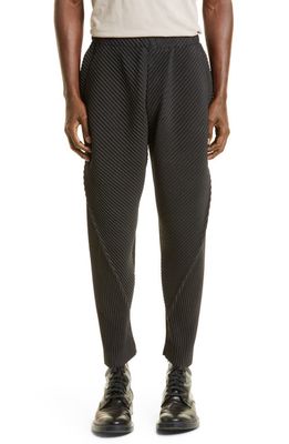 Homme Plissé Issey Miyake Arc Pleated Pants in Coke Gray - Shop