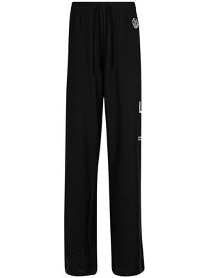 Honor The Gift Love embroidered-slogan track pants - Black