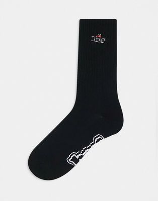HUF produce socks in black with embroidery
