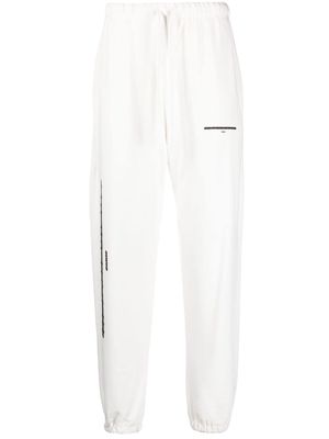 Ih Nom Uh Nit graphic-print cotton track pants - White