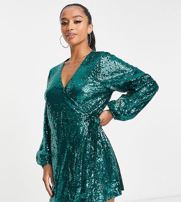 In The Style Petite exclusive sequin wrap detail mini dress in emerald green