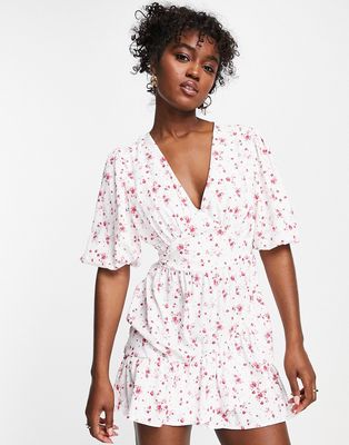 In The Style x Perrie Sian puff sleeve frill wrap detail mini dress in white ditsy print-Multi