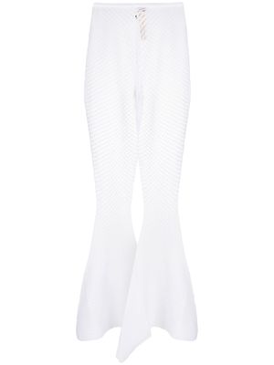 Isa Boulder open-knit sheer flared trousers - White