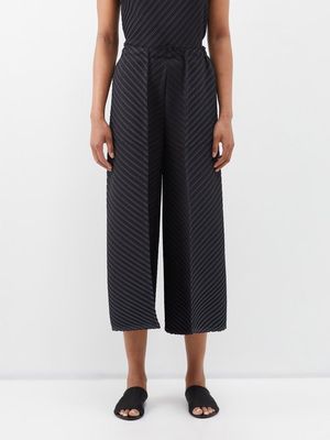 Issey Miyake - Technical-pleated Jersey Cropped Trousers - Womens - Black