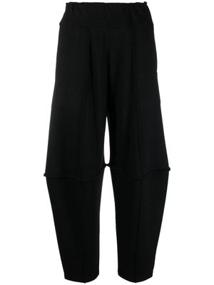 Issey Miyake Tucked wool cropped tapered trousers - Black