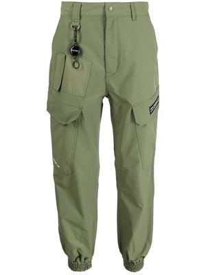 izzue elasticated ankles trousers - Green