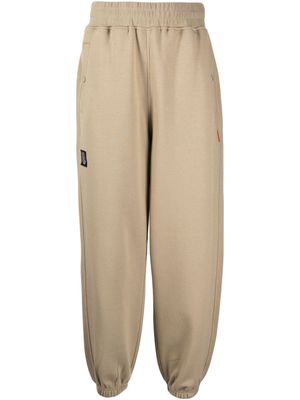 izzue Label logo-patch cotton blend track pants - Brown