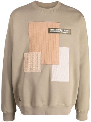 izzue logo-appliqué panelled sweatshirt - Brown