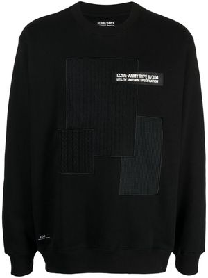 izzue logo-appliqué patchwork sweatshirt - Black