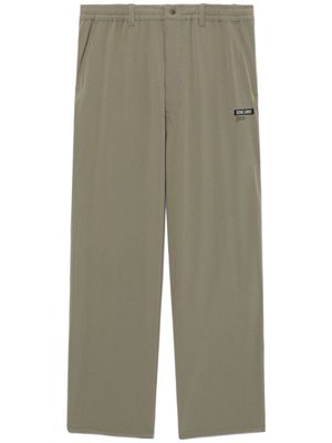 izzue logo-appliquéd trousers - Green