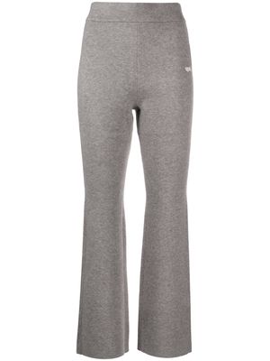 izzue logo-embroidered flared trousers - Grey