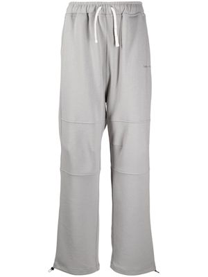 izzue logo-embroidered panelled track pants - Grey