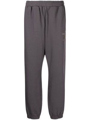 izzue logo-embroidered track pants - Grey