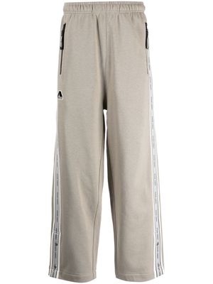 izzue logo-patch cotton-blend track pants - Brown
