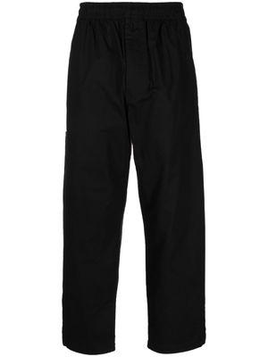 izzue logo-patch elasticated trousers - Black