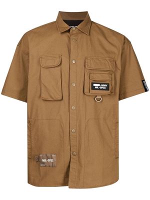 izzue logo-patch pocketed shirt - Brown
